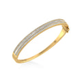 10K Yellow Gold Round Baguette Diamond Designer Bangle Bracelet 2 Cttw crafted in 14K gold with brilliant-cut diamonds