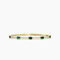 14KY Classic 4 Prong 0.68 Ctw Flex Diamond Bangle Bracelet with Oval 7X5 Emerald