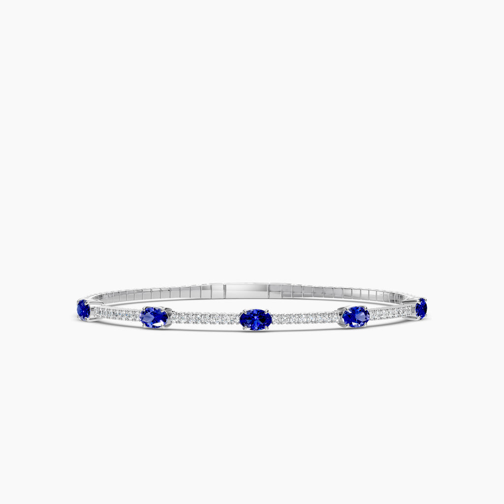 14KW Classic 4 Prong 0.68 Ctw Flex Diamond Bangle Bracelet with Oval 7X5 Sapphire