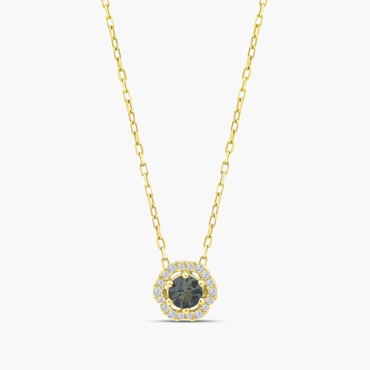 10KY 1/20 CTW RD FASHION PENDANT WITH CTR RD MONTANA SAPH &JB&SC