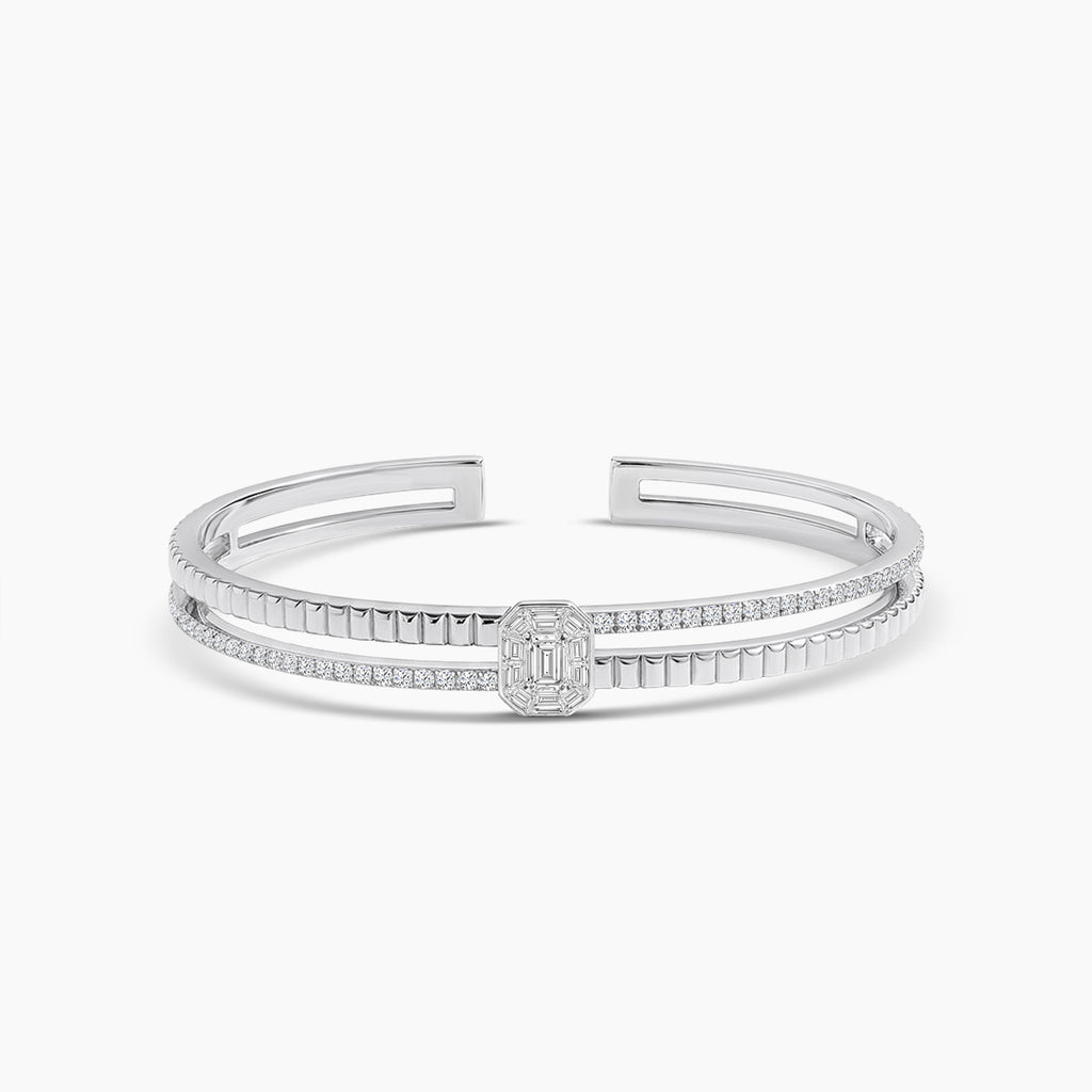 18KW 1.07 CTW DIAMOND DECO BANGLE (64RD-0.55,10BG-0.33,1EM-0.19)